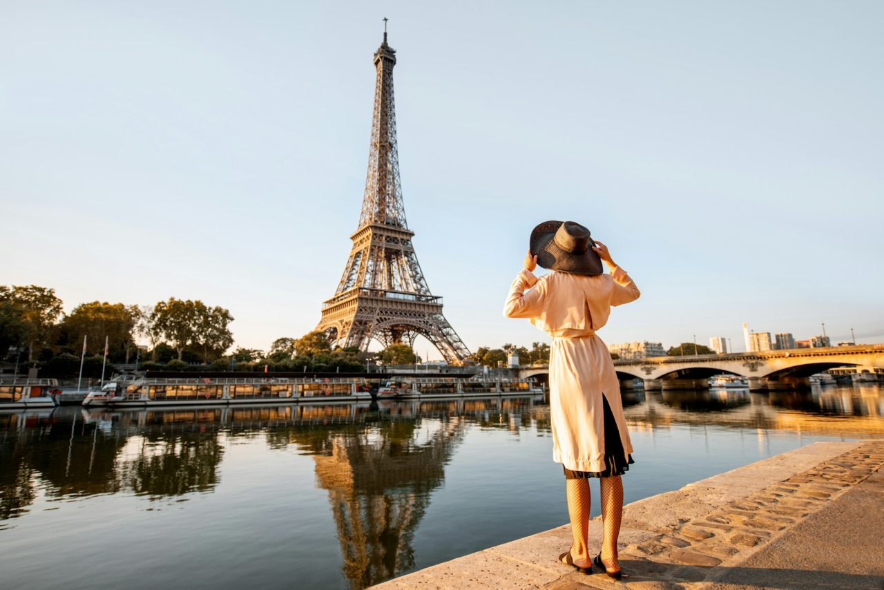 woman-enjoying-eiffel-tower-in-paris.jpg
